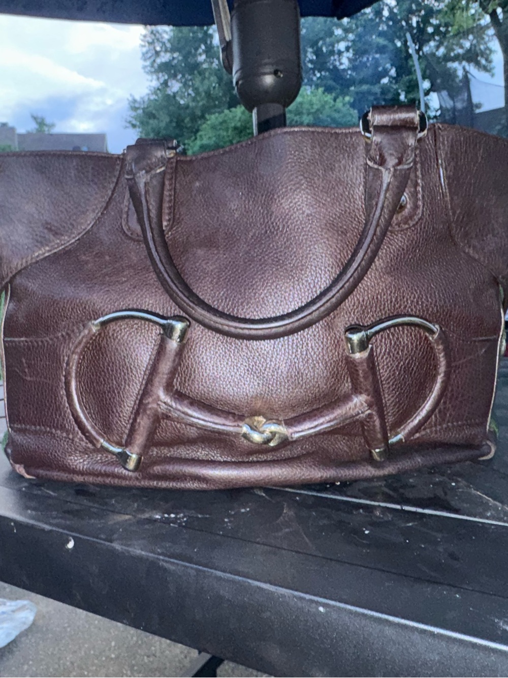Gucci brown leather satchel.